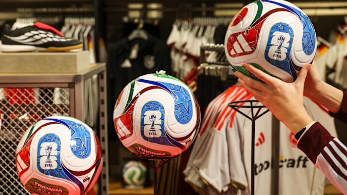 Adidas shares drop close to a fifth after profits hit by World Cup marketing spend – Financial Times